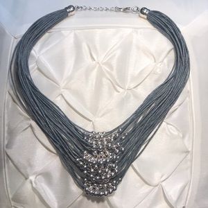 Gray/silver beaded necklace. Never worn!